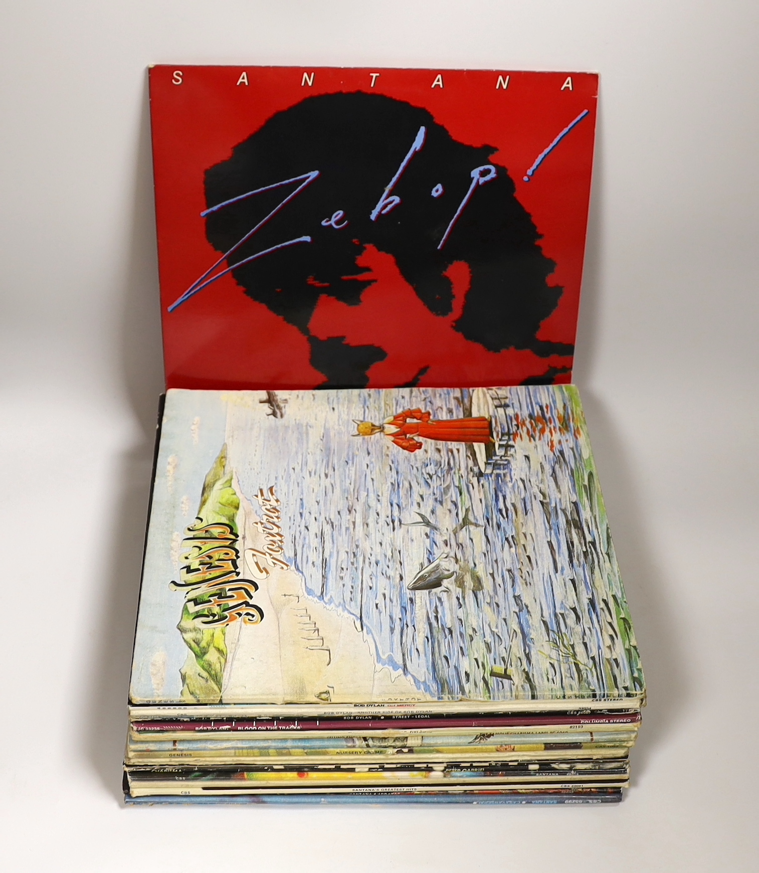 Twenty-three LP albums by Bob Dylan, Genesis, Peter Gabriel and Santana, albums include Blood on the Tracks, Street Legal, Oh, Mercy, Foxtrot, Selling England, by the Pound, Trespass, Nursery, Cryme, The Lamb Lies Down o